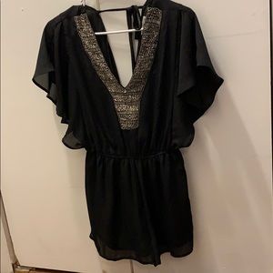 Black romper with beaded front and low back